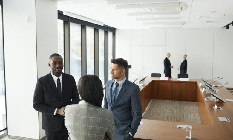 Business professionals in a modern conference room discussing investment strategies and venture capital decisions