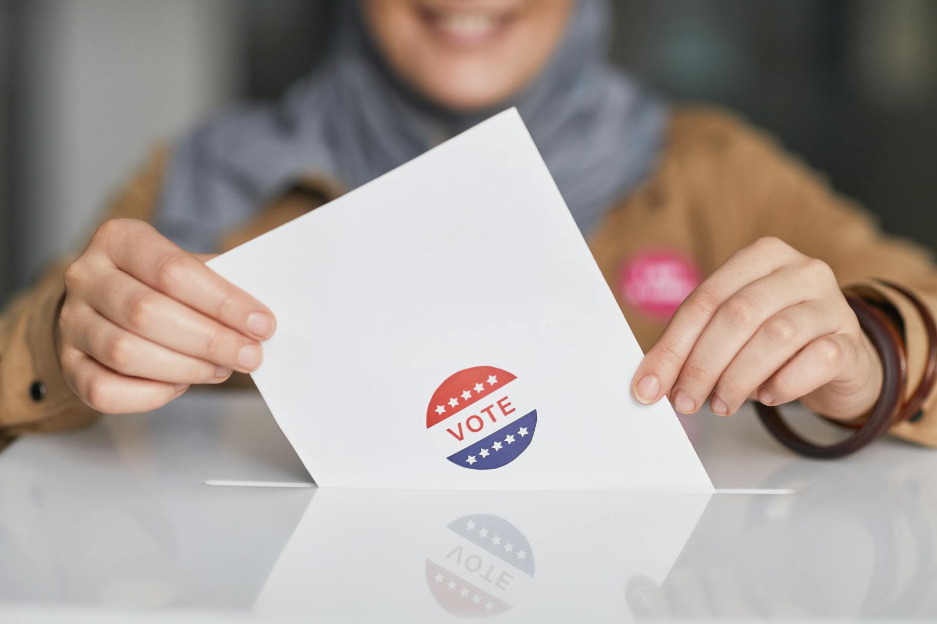 Close-up view of voting ballot with multiple candidate options and ranking system