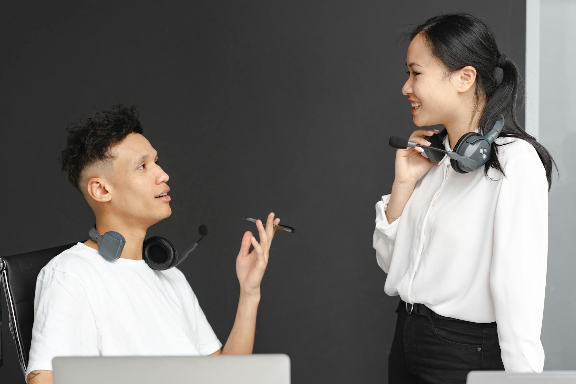 Professional headset on office desk representing customer service communication technology