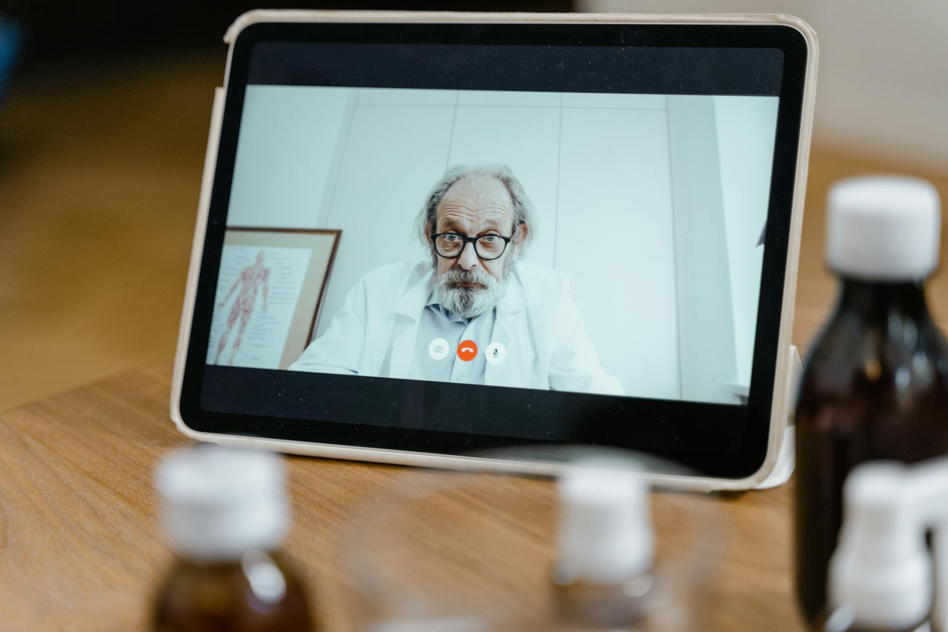 Senior patient consulting with healthcare provider about insurance options and medical care access