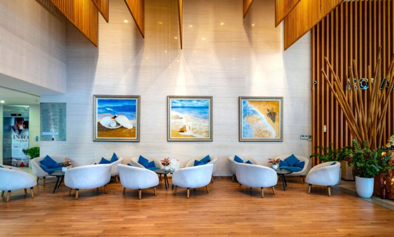 Modern hotel lobby with comfortable seating and professional reception area