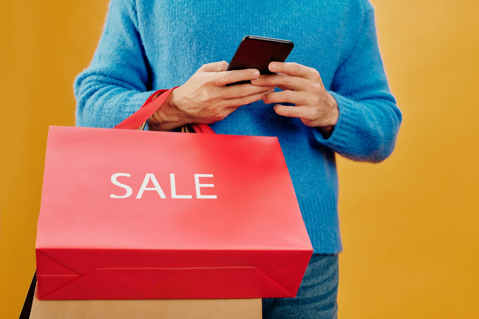 Person using smartphone app for grocery shopping and order management