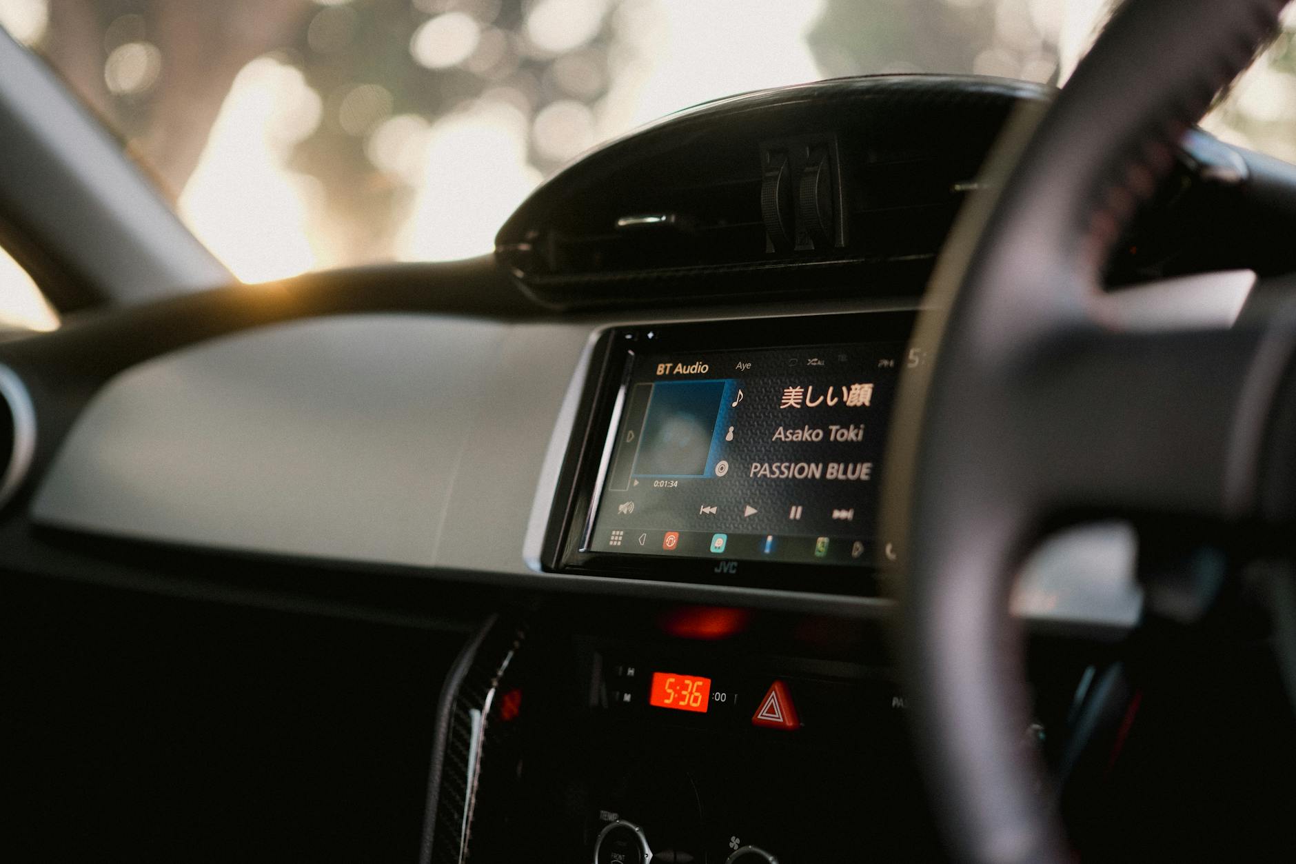 Car radio dashboard during morning commute