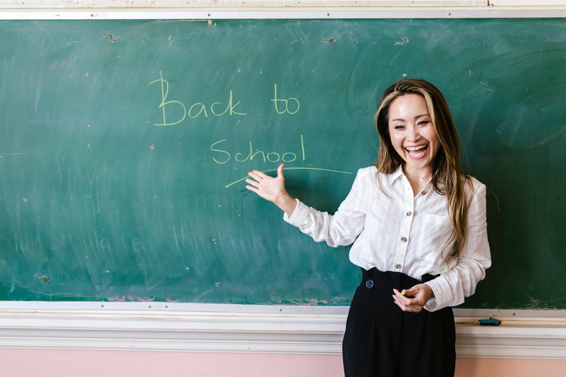 Overwhelmed educator managing multiple responsibilities due to staffing shortages