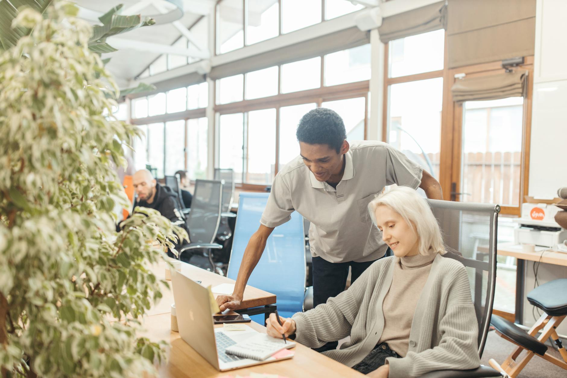 Contemporary coworking space interior with flexible seating arrangements and modern amenities