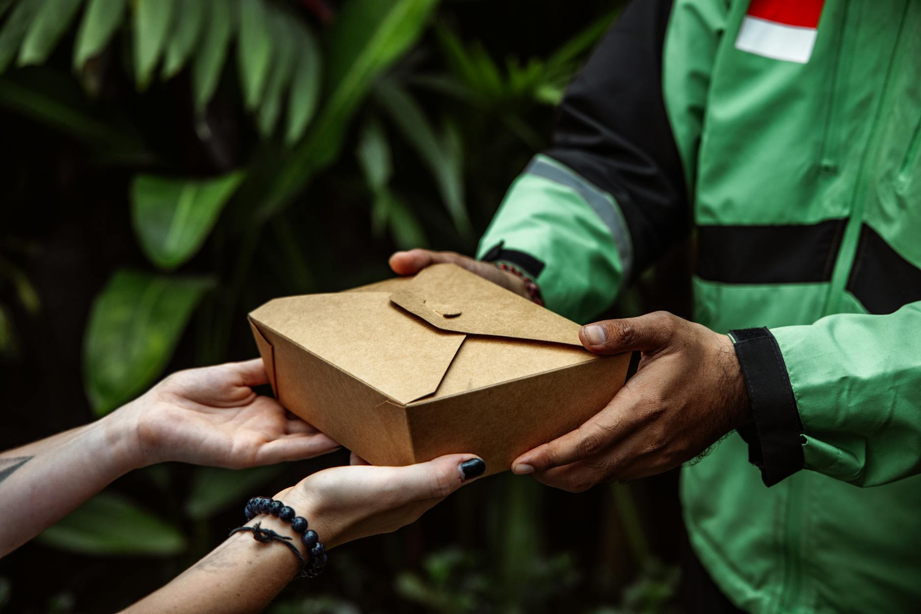 Meal kit delivery box with fresh ingredients and recipe cards