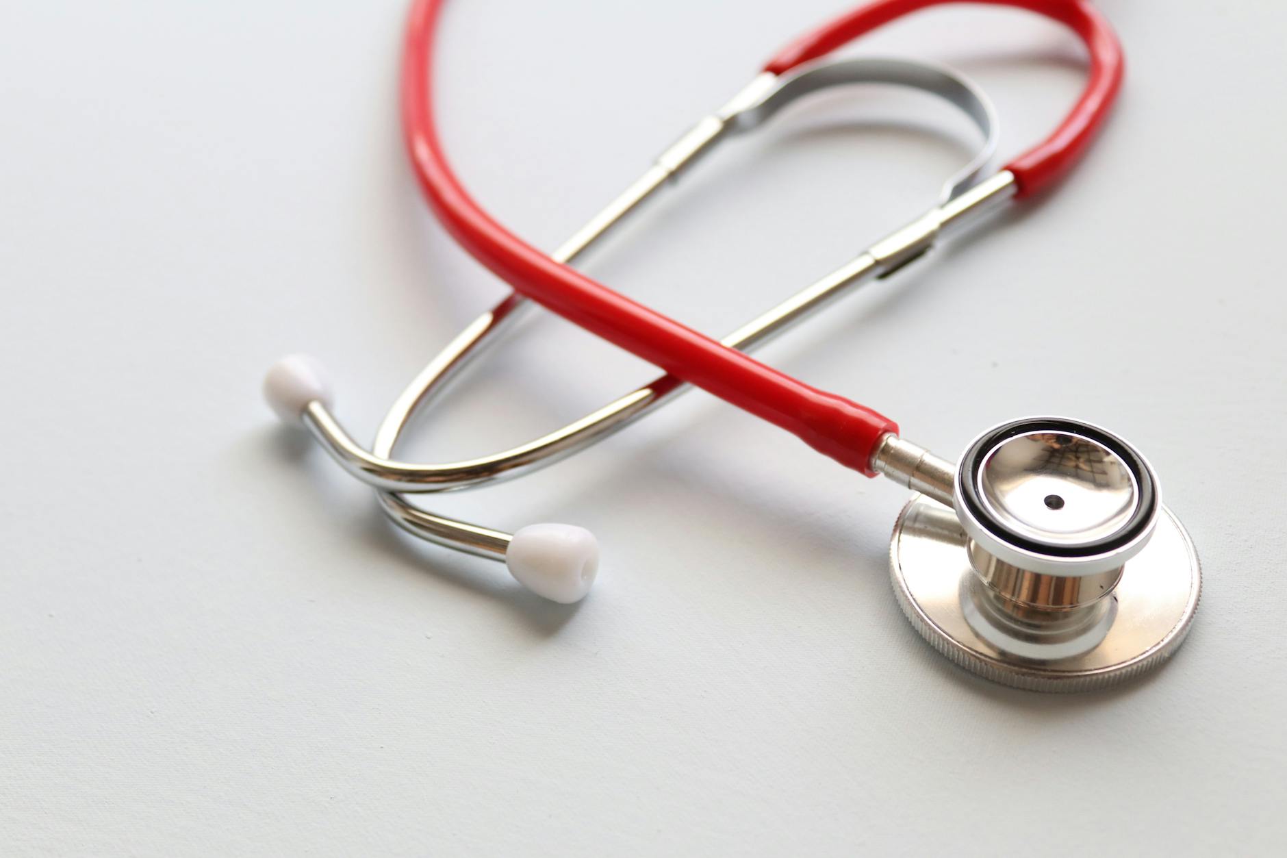 Medical stethoscope on white background representing healthcare industry