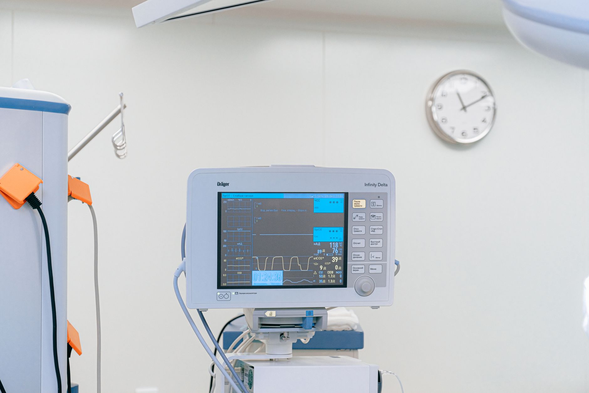 Interior of a modern urgent care clinic waiting room with bright lighting and reception desk
