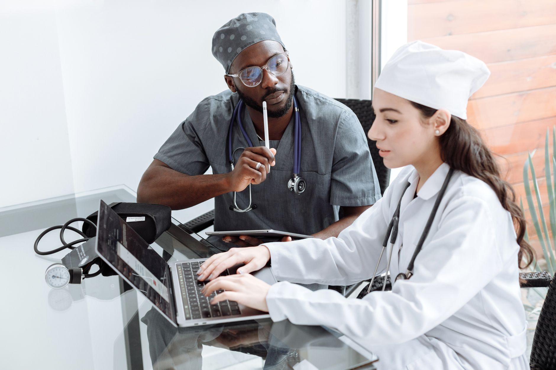 Physicians and administrators meeting in a conference room
