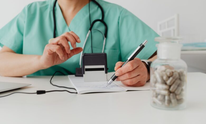 A medical billing office with staff working at computers on insurance documentation