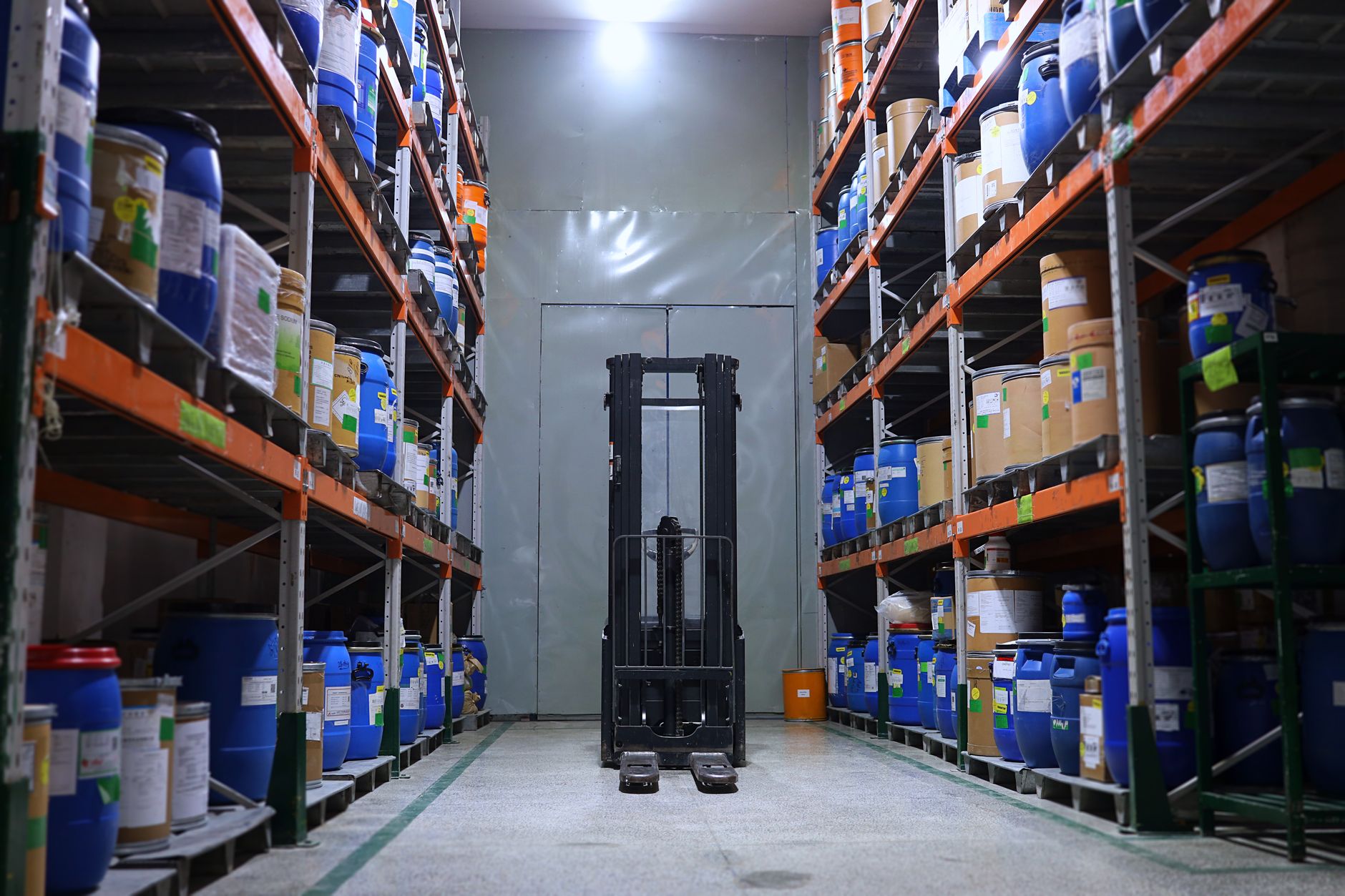 Interior of a medical supply warehouse with shelving units stocked with healthcare equipment and supplies