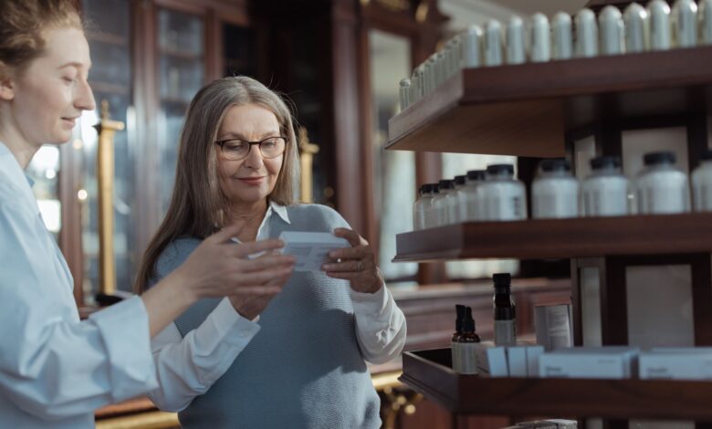 Pharmacy shelves stocked with medication bottles representing hospice drug supply logistics