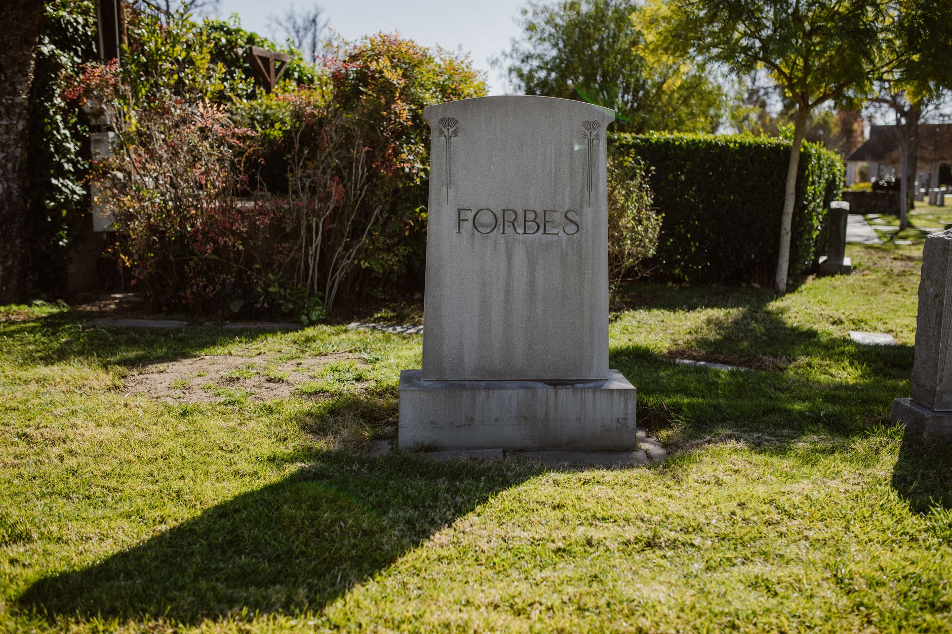 Exterior of a small family-owned funeral home on a quiet residential street