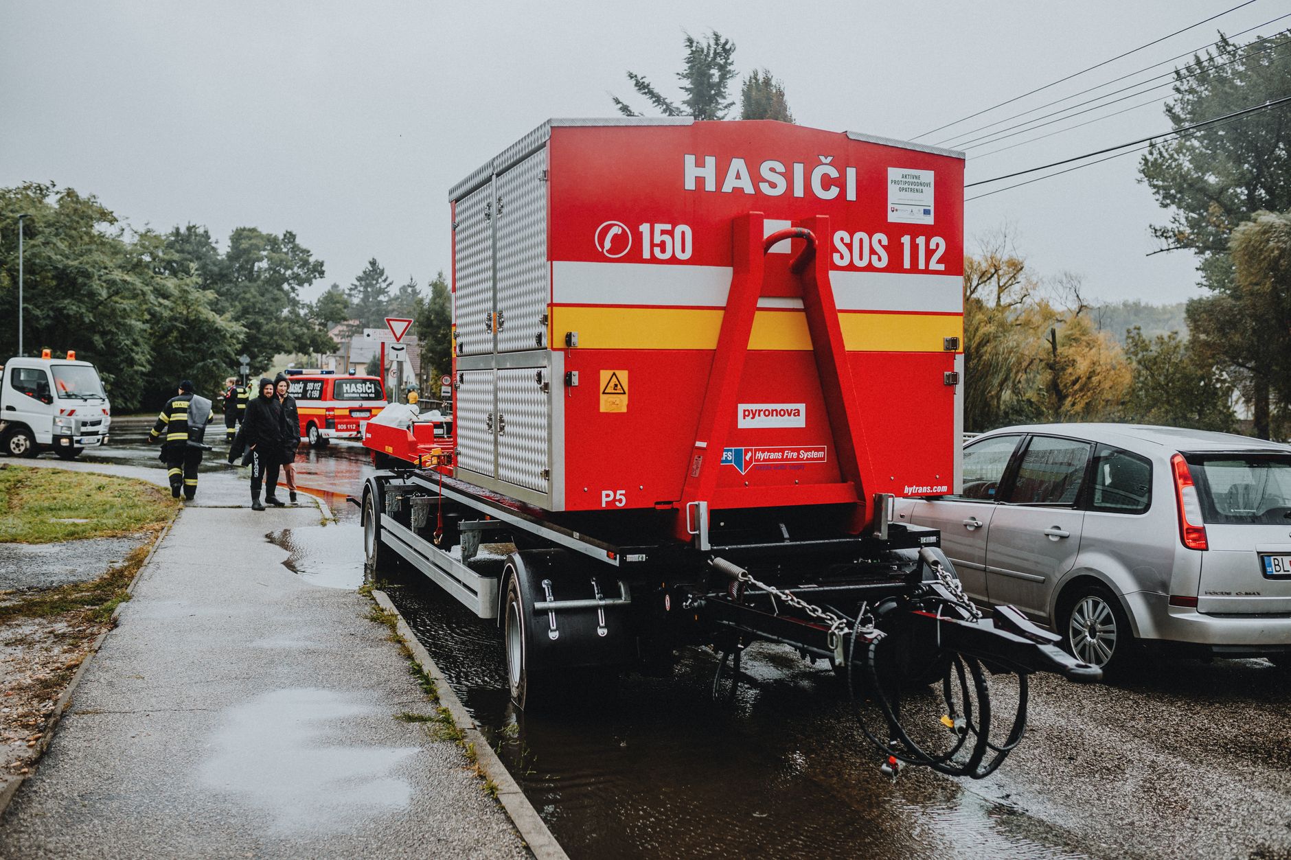 An ambulance on a rural road illustrating the challenges of remote EMS service delivery