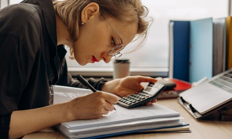 Accountant working at a desk in a regional CPA firm office