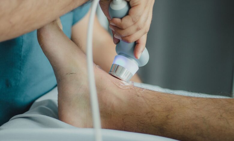 Physical therapist working with patient in outpatient clinic setting