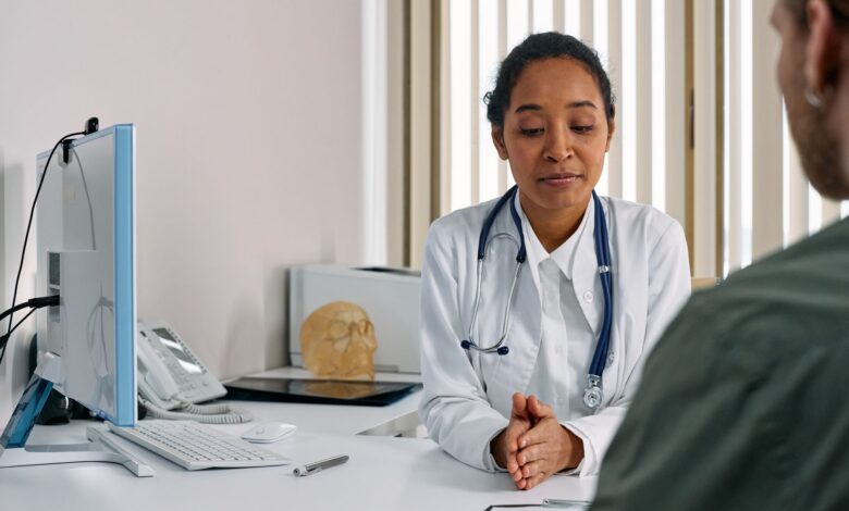 Physician consulting with a patient in a modern medical office setting