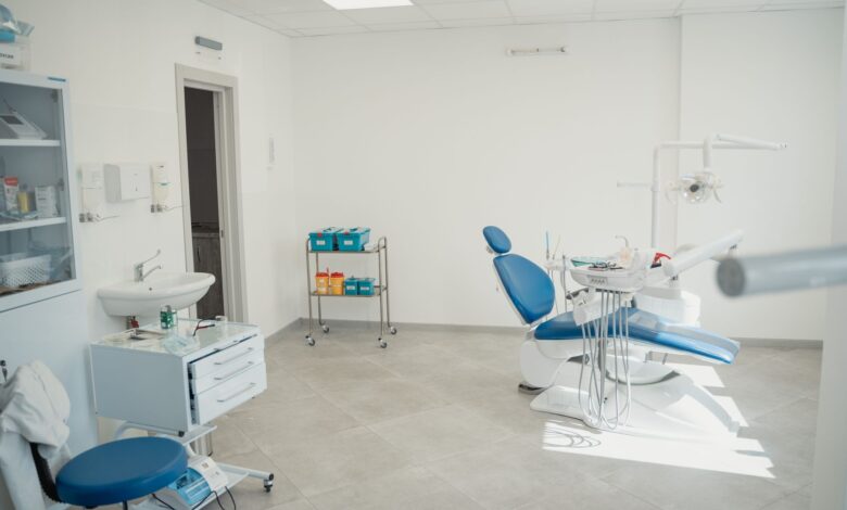 A modern dental or oral surgery office reception area with clean white interior