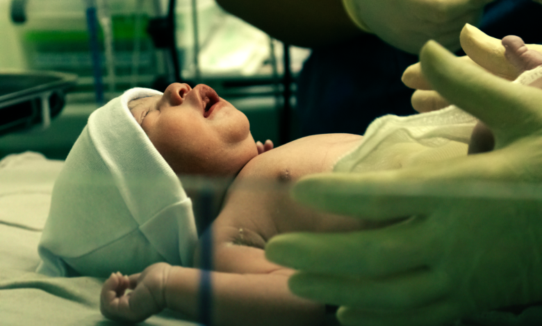 A neonatal intensive care unit with medical equipment and incubators