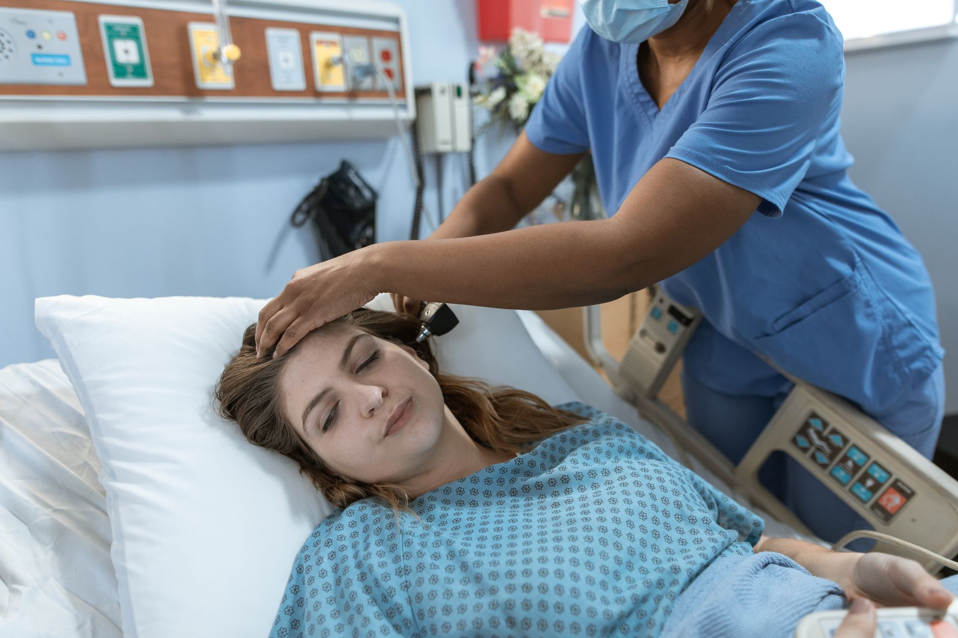 A hospice nurse providing compassionate care to a patient at home