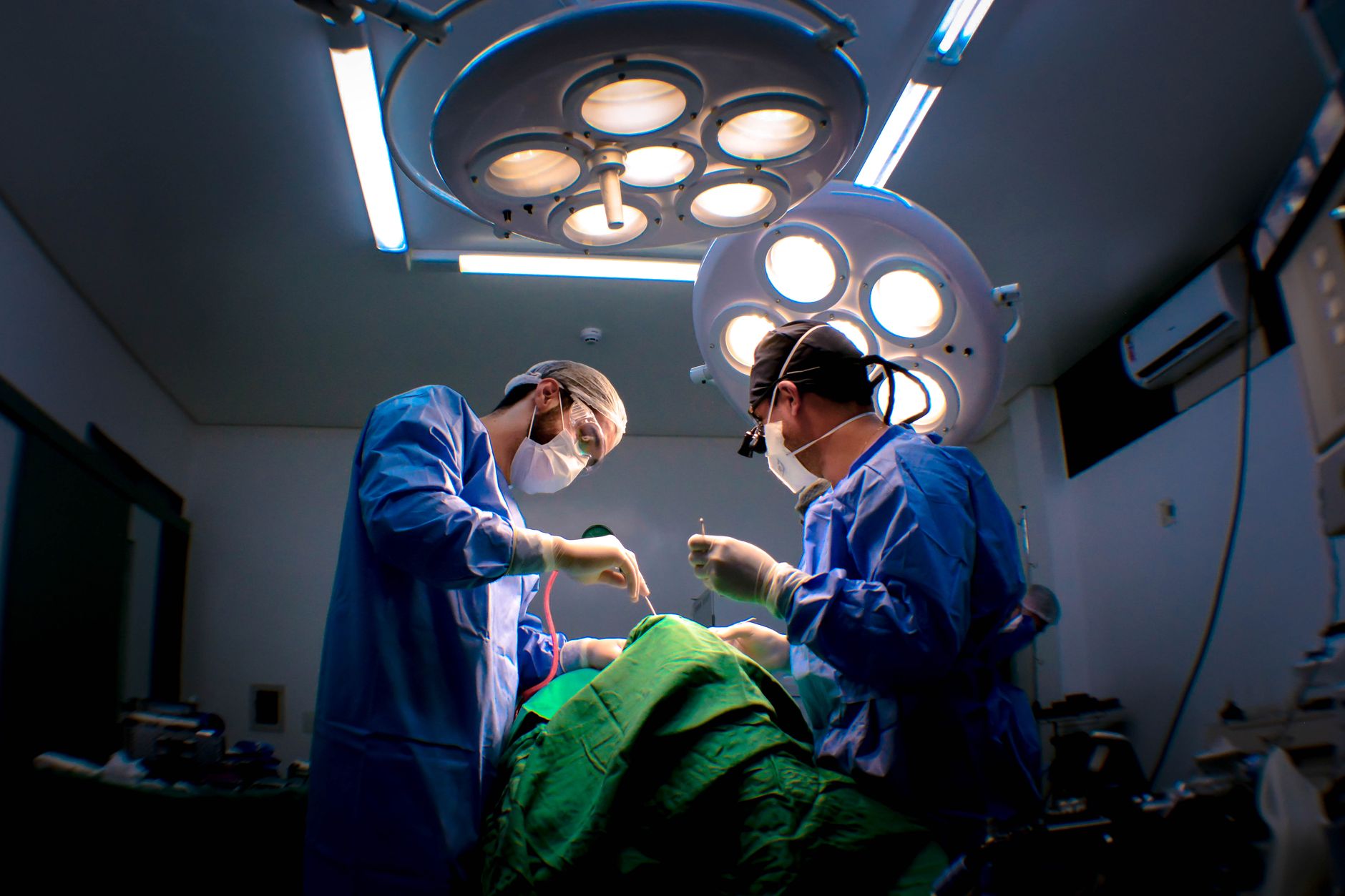 Surgical team working in an outpatient operating room environment